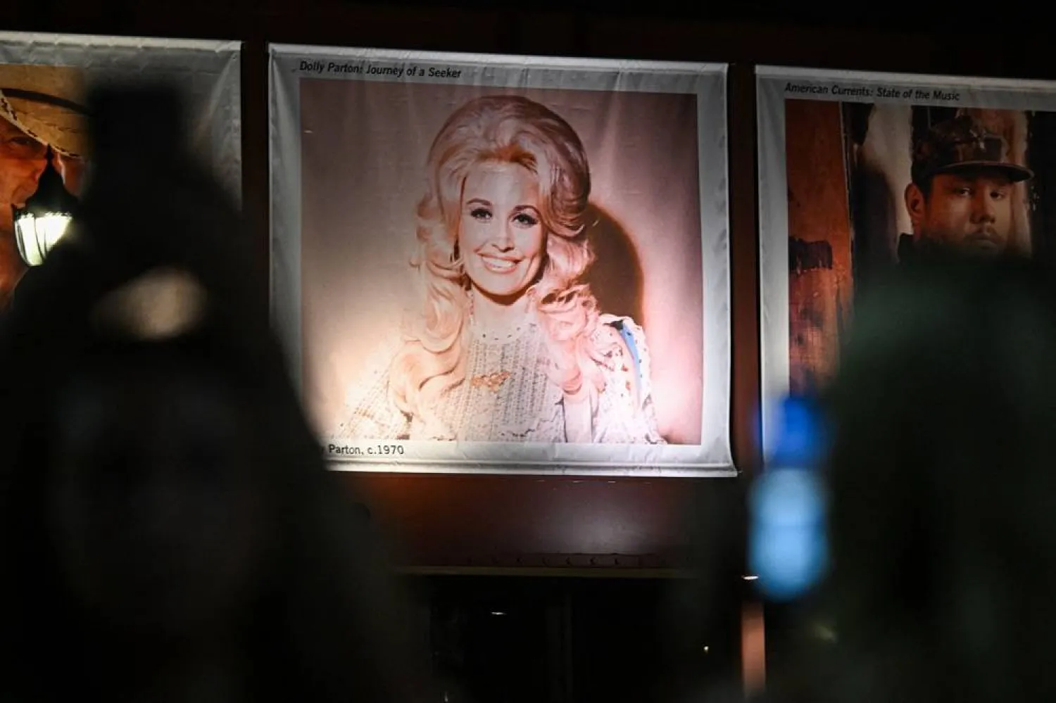 A photo of the late US singer-songwriter Dolly Parton is displayed at the Country Music Hall of Fame and Museum in Nashville, Tennessee on August 25, 2026. (AFP)