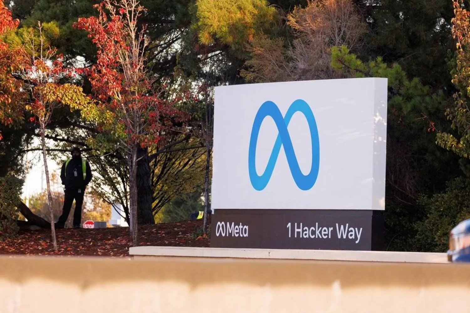 A security guard stands watch by the Meta sign outside the headquarters of Facebook parent company Meta Platforms Inc in Mountain View, California, US, November 9, 2022. (Reuters)