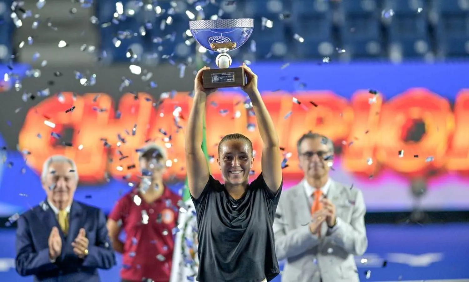 Diane Parry of France lifts the champion’s trophy after defeating Elise Mertens of Belgium during the women's singles final of the Monterrey Open tennis tournament in Monterrey, Mexico, 29 August 2026. (EPA) 