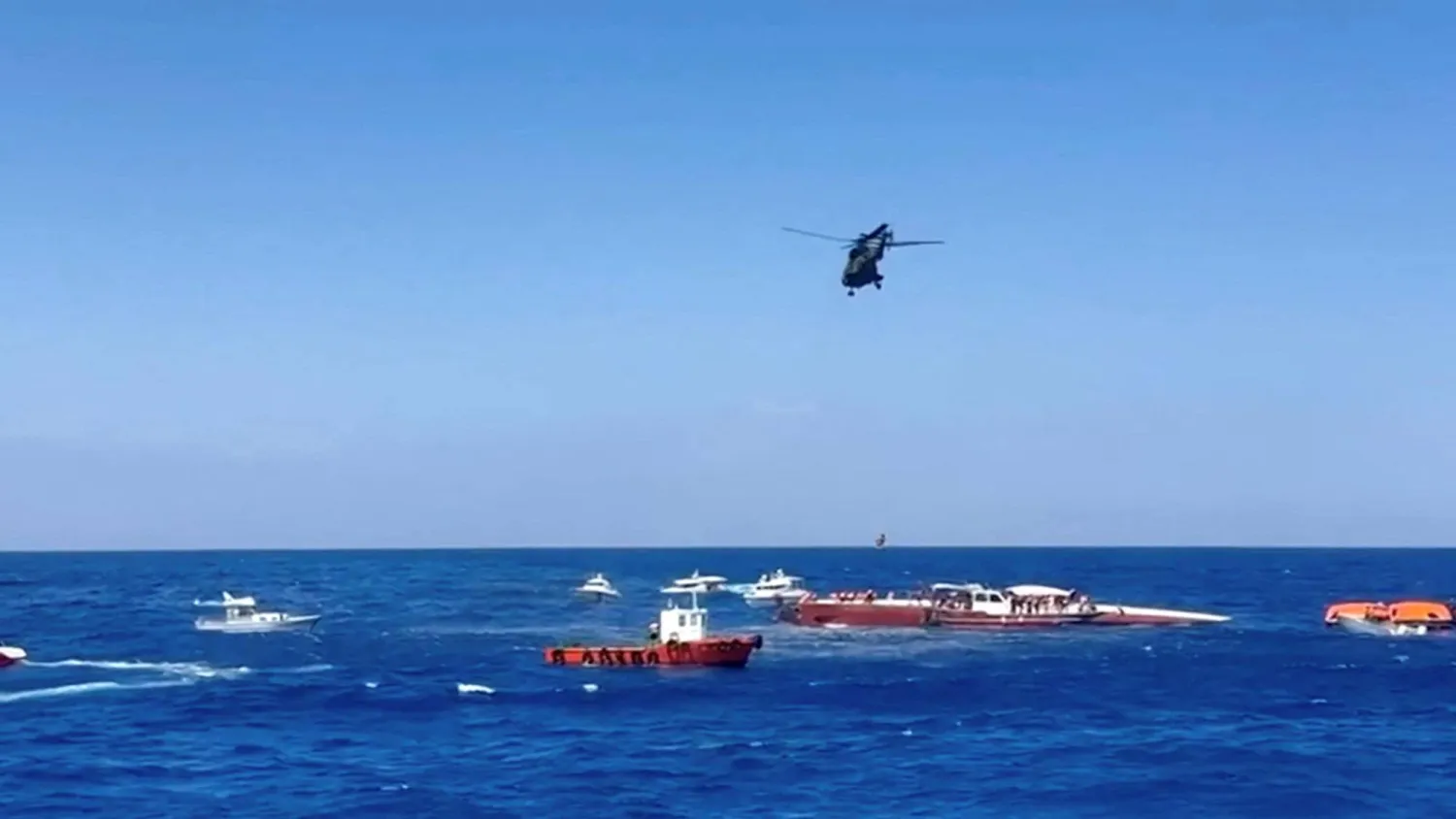 A helicopter rescues a passenger off a ferry that capsized off the coast of Northern Cyprus, August 30, 2026. (Reuters)