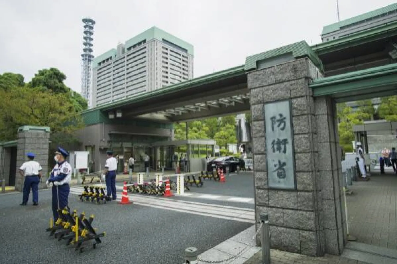 This photo shows an exterior view of the Defense Ministry of Japan with its sign at the main entrance in Tokyo on Sept. 17, 2021. (AP Photo/Hiro Komae, File)