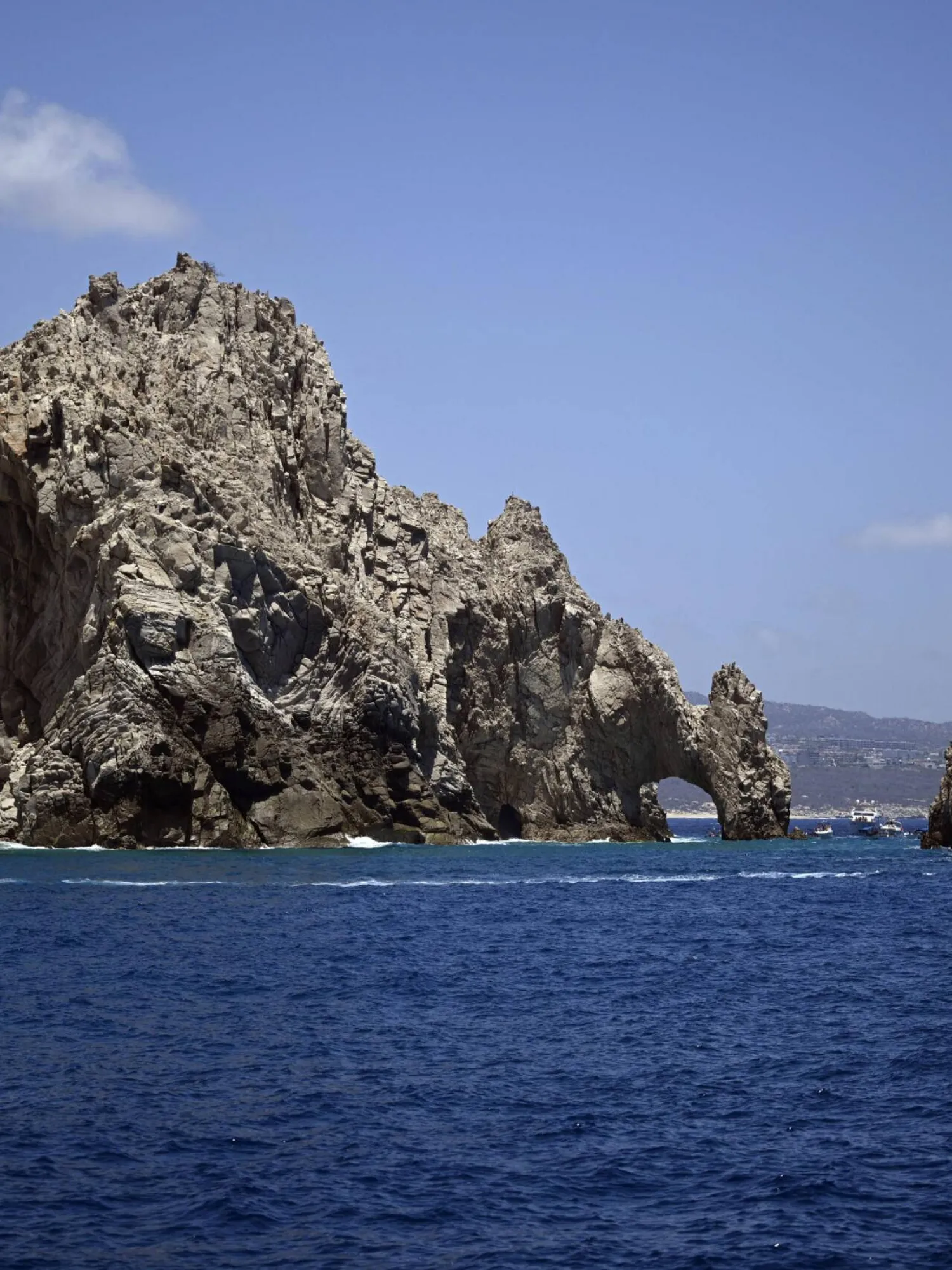 View of a rock formation at the Pacific Ocean in Cabo San Lucas, Baja California state, Mexico on August 4, 2023. AFP
