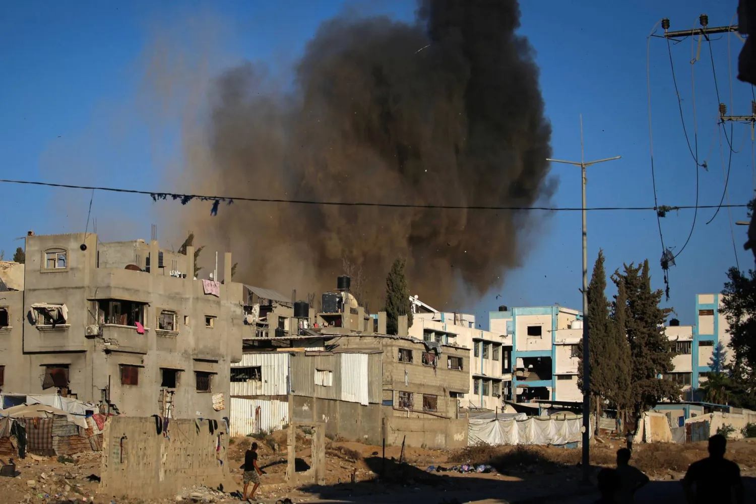 Smoke rises following an Israeli strike at the al-Bureij refugee camp in central Gaza Strip on August 24, 2026. (AFP) 