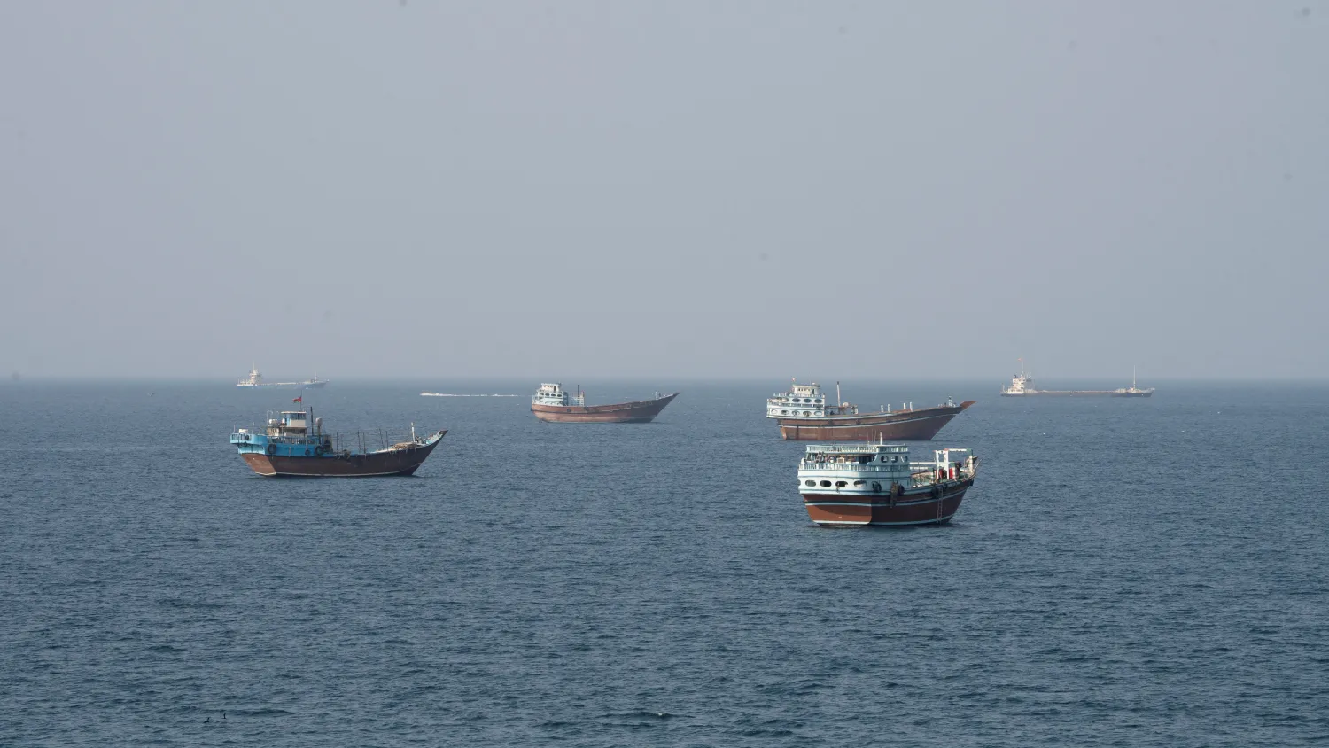 Vessels near the Strait of Hormuz, as seen from Musandam, Oman, August 17, 2026. (Reuters)