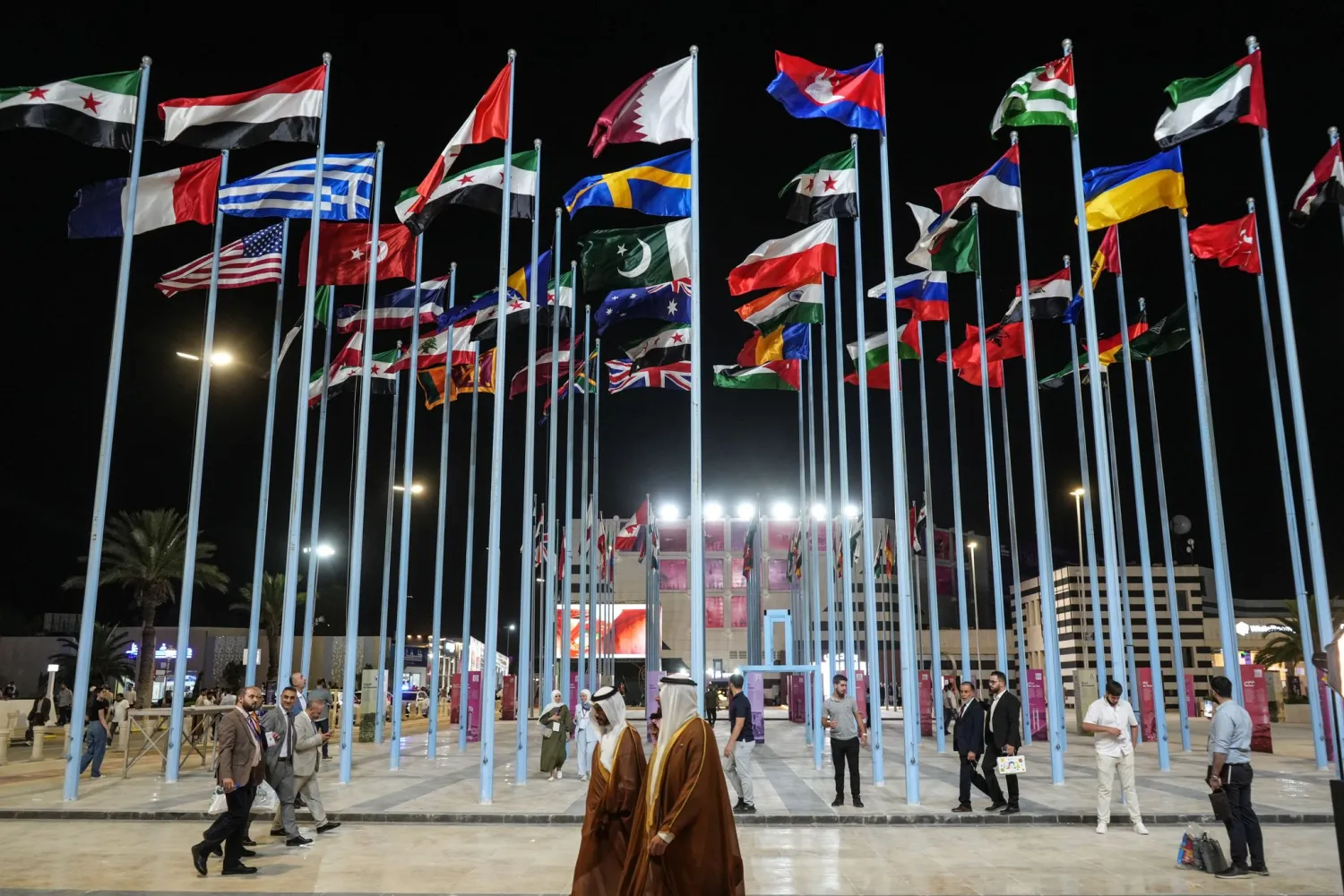 26 August 2026, Syria, Damascus: People walk at the Damascus Fair Grounds during the opening ceremony of the 63rd Damascus International Fair. (dpa) 