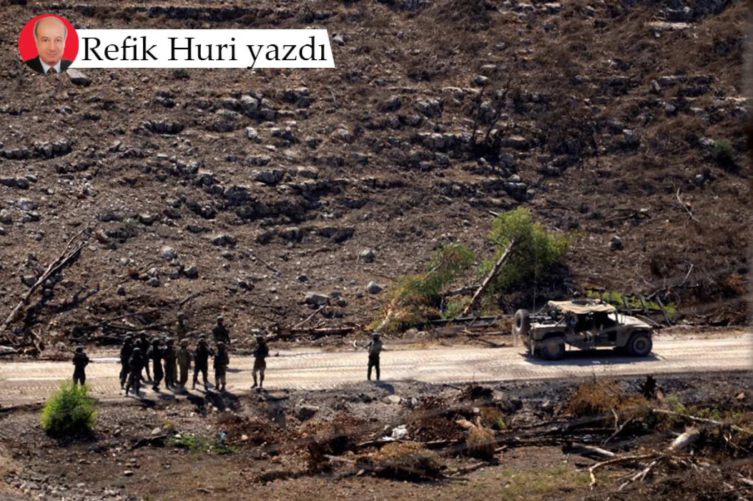 Güney Lübnan'da bir köyde konuşlanmış İsrail askerleri (AFP)