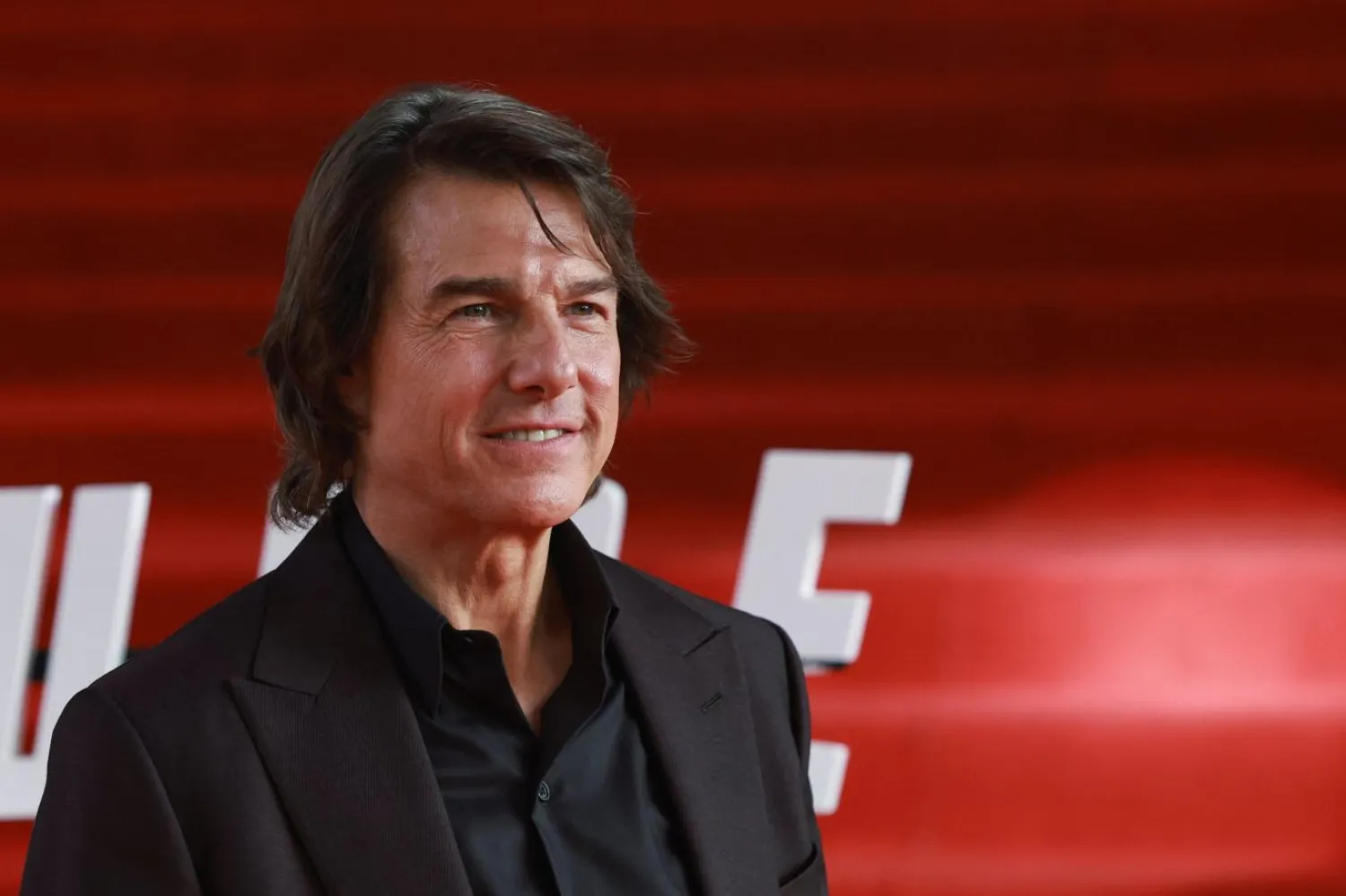 64 yaşındaki Tom Cruise, yeni filminde kendi tetiklediği küresel bir felaketi "insanlığın kurtarıcısı" rolüne bürünerek önlemeye çalışan dünyanın en güçlü insanı Digger Rockwell'i canlandırıyor (Reuters)