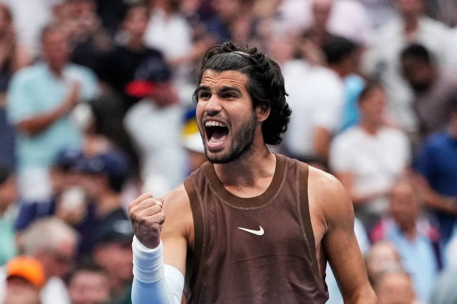 Carlos Alcaraz, of Spain, celebrates winning a match against Roman Safiullin, of Russia, during the first round of the US Open tennis championships, Monday, Aug. 31, 2026, in New York. (AP)