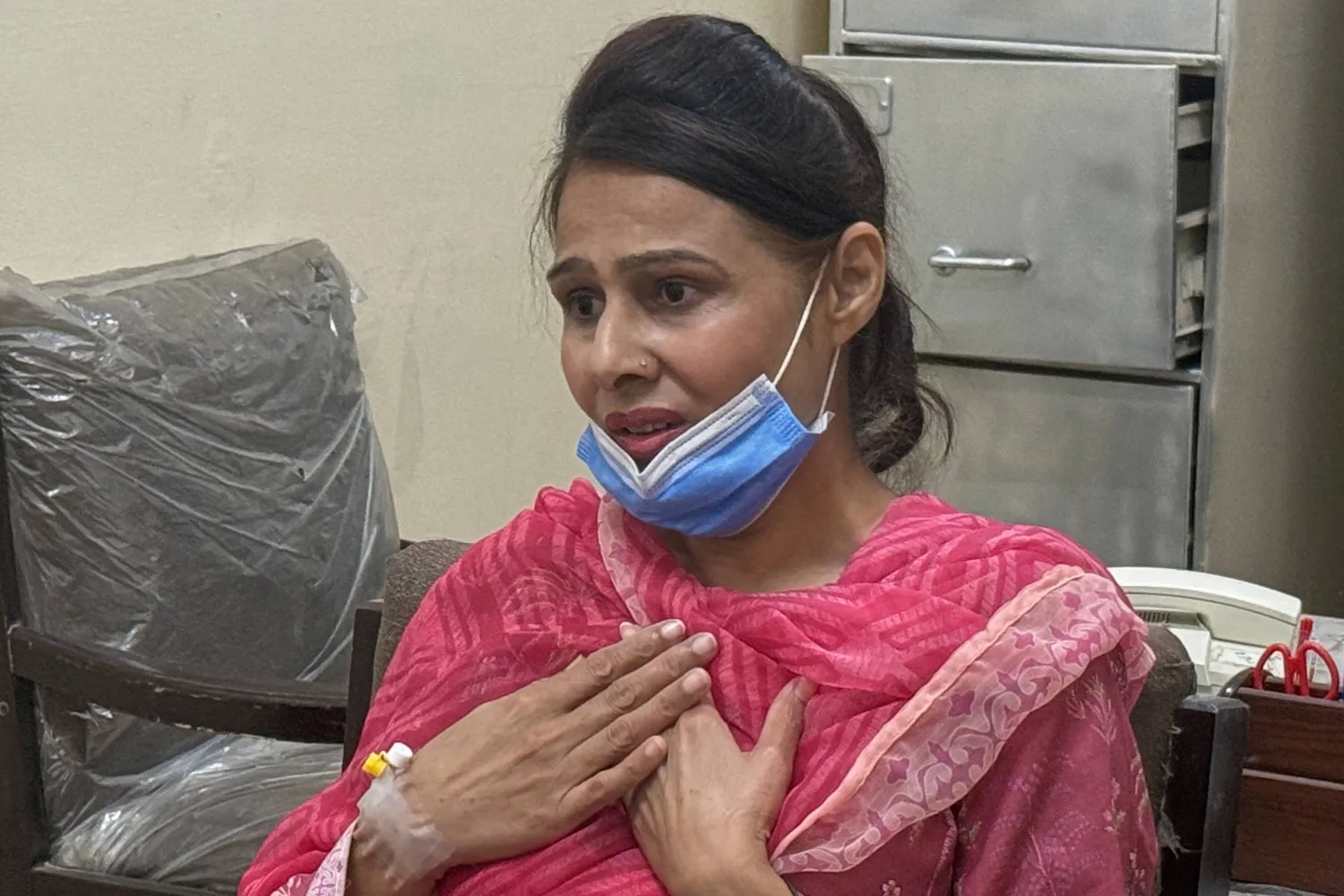  Nurse Razia Noreen, who risked her life to save a newborn during a fire at the Pakistan Institute of Medical Sciences, speaks during an interview in Islamabad, Tuesday, Sept. 1, 2026. (AP) 