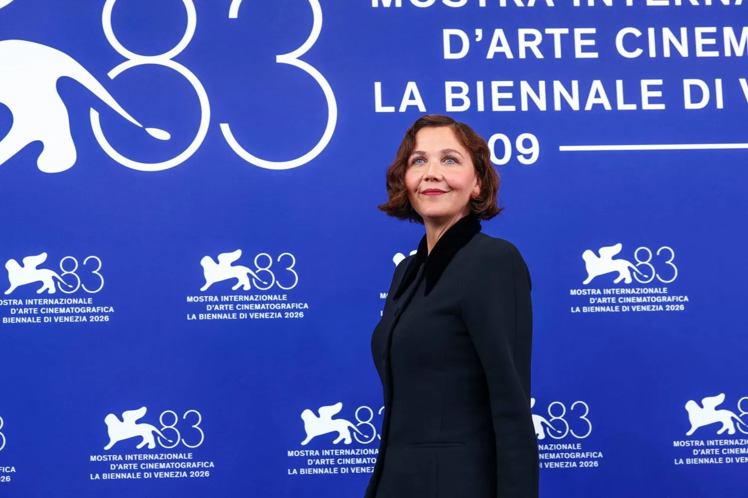 Venezia 83 Competition Jury president Maggie Gyllenhaal poses at the 83rd Venice International Film Festival, in Venice, Italy, September 2, 2026. (Reuters) 