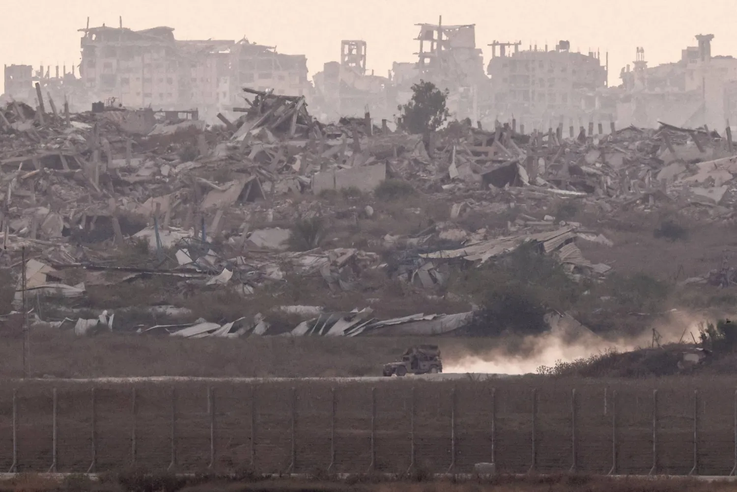An Israeli military vehicle maneuvers in Gaza, as seen from the Israeli side of the border, September 1, 2026. (Reuters)