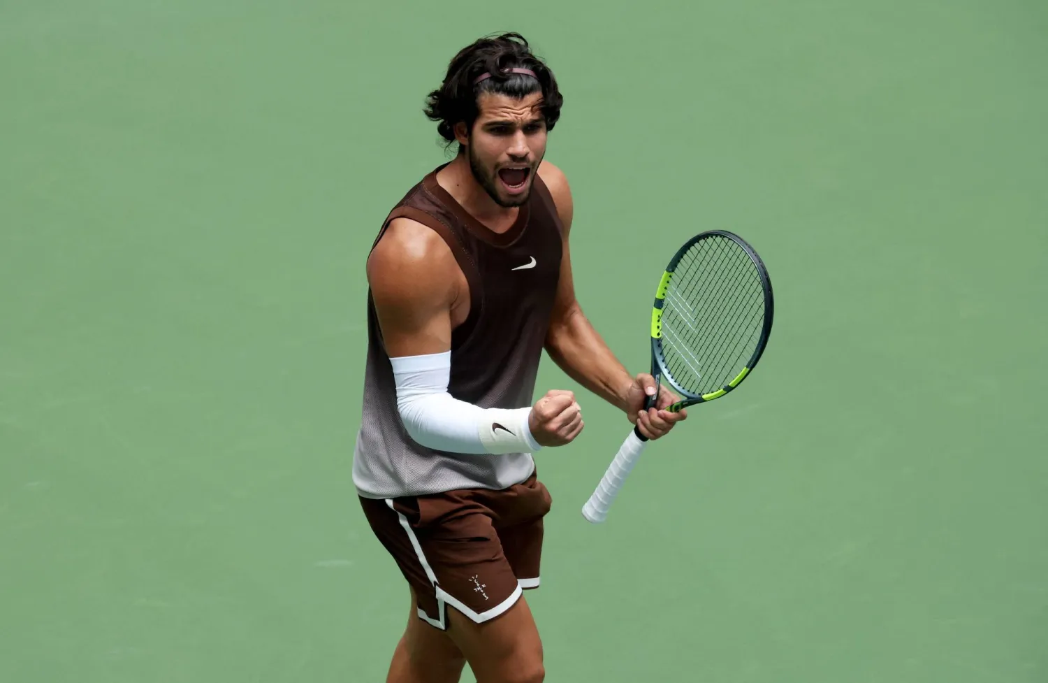 NEW YORK - AUGUST 31: Carlos Alcaraz of Spain celebrates a point against Roman Safiullin during their Men's Singles First Round match on Day Two of the 2026 US Open at USTA Billie Jean King National Tennis Center on August 31, 2026 in the Flushing neighborhood of the Queens borough of New York City.   Clive Brunskill/Getty Images/AFP 