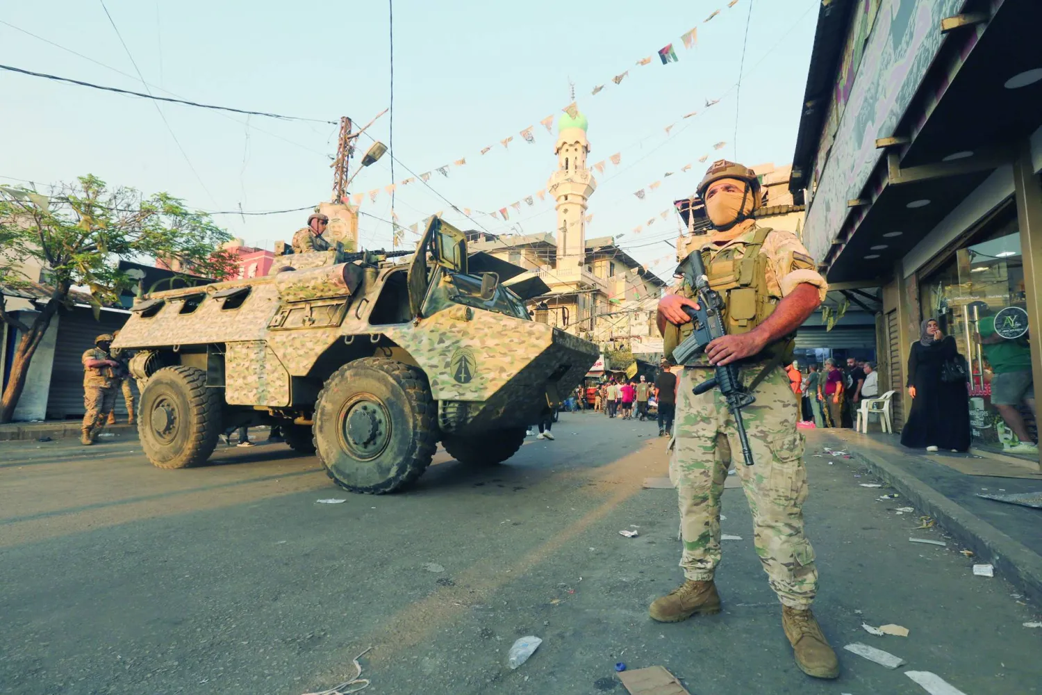 Lebanese soldiers stand guard at the entrance of Burj Barajneh Palestinian refugee camp in southern Beirut, Lebanon, 21 August 2025.   EPA/WAEL HAMZEH