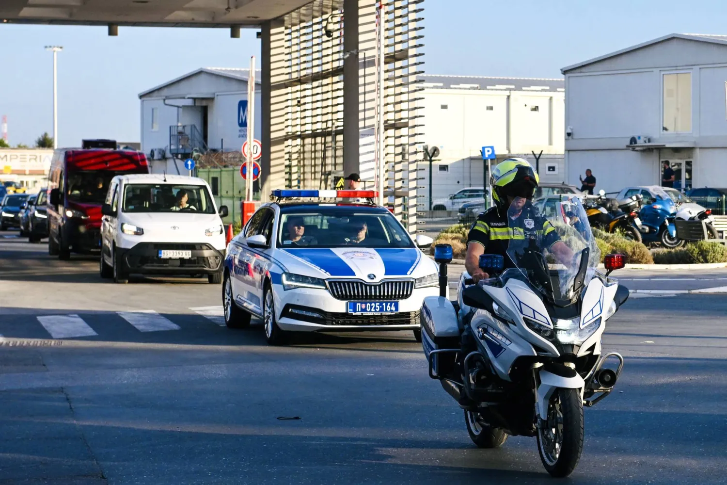 A convoy of vehicles, escorted by police, carrying the coffin of deceased Bosnian Serb General Ratko Mladic leaves Belgrade Airport, in Belgrade, Serbia, 03 September 2026. (EPA)