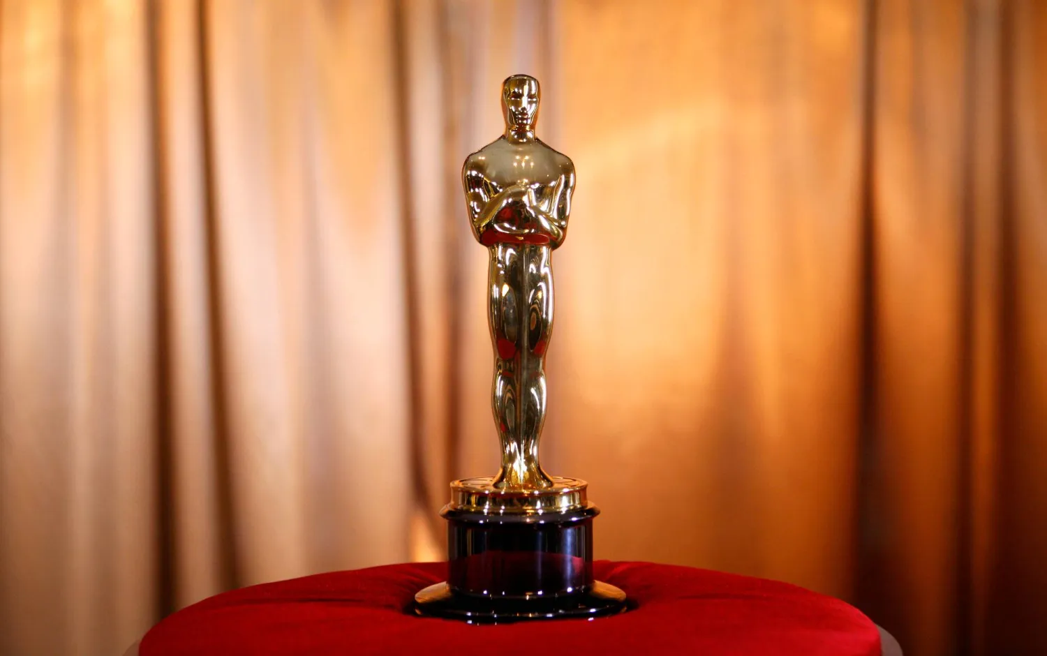 FILE - An Oscar statuette sits on display at an opening event for the "Meet The Oscars, New York" exhibit at the Time Warner Center in New York, Feb. 25, 2010. (AP Photo/Jason DeCrow, File)