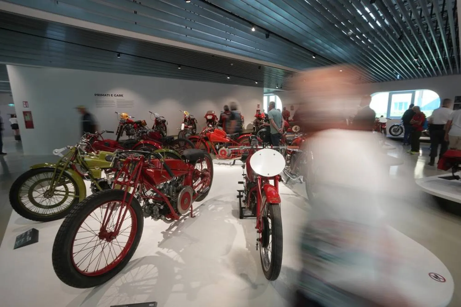 Riders and visitors enjoy Guzzi motorcycles displayed at the museum during the Guzzi opening inaugurating its completely redeveloped historic factory and new museum as the motorcycle maker celebrates its 105th anniversary, in Mandello del Lario, Thursday, Sept. 3, 2026. (AP) 