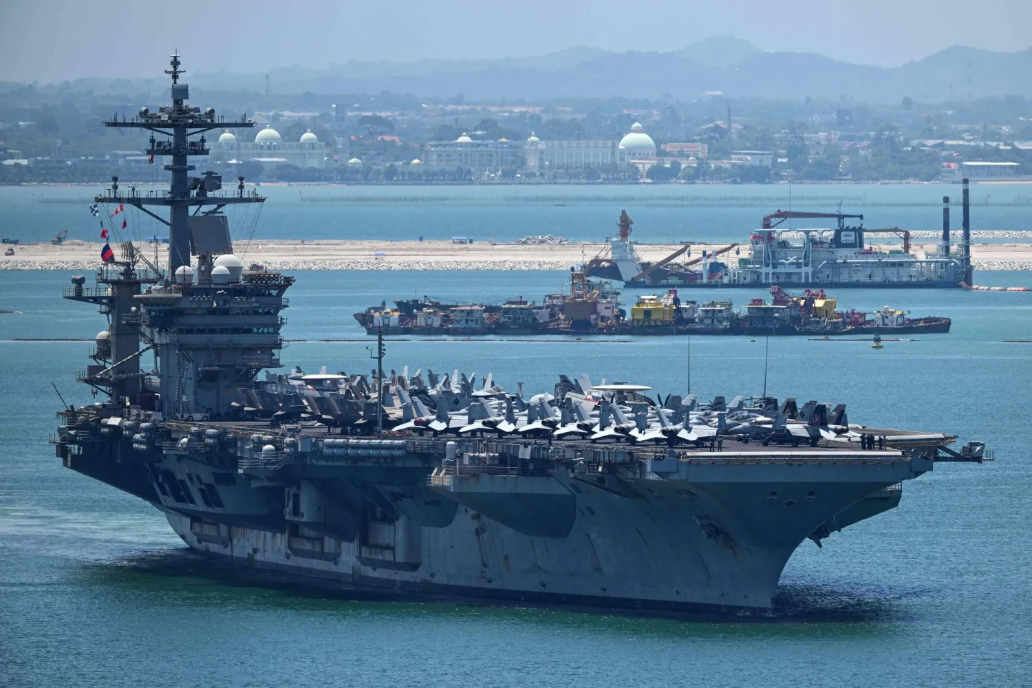 US nuclear-powered aircraft carrier USS Abraham Lincoln (CVN-72) departs Laem Chabang Port, near the city of Pattaya on September 6, 2026. (Photo by Chanakarn LAOSARAKHAM / AFP)