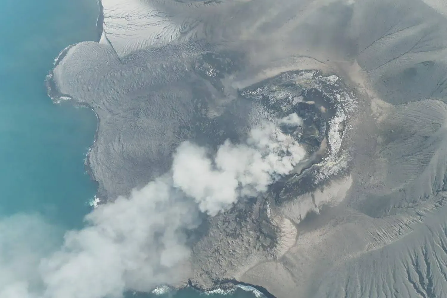 In this drone photo released by the Geological Agency (Badan Geologi) of Indonesia's Ministry of Energy and Mineral Resources, Mount Anak Krakatau spews volcanic smoke in Sunda Strait, Indonesia, Saturday, Sept. 5, 2026. (Badan Geologi via AP)