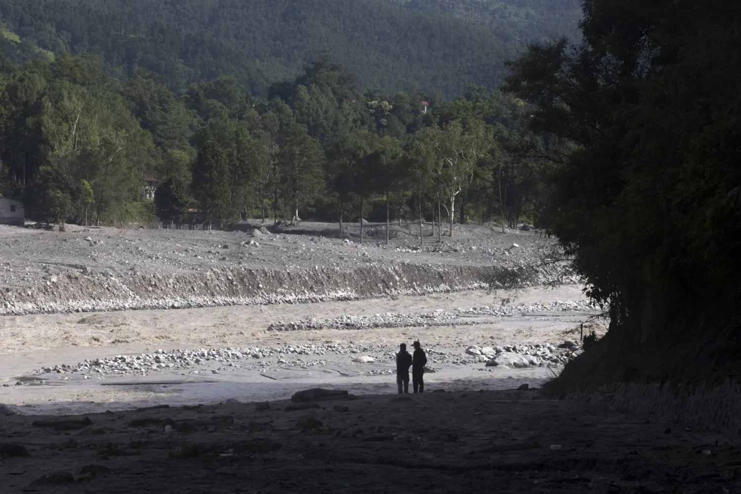 People walk through a flood-affected area in Devighat, Nuwakot district, Nepal, 05 September 2026. EPA/NARENDRA SHRSTHA