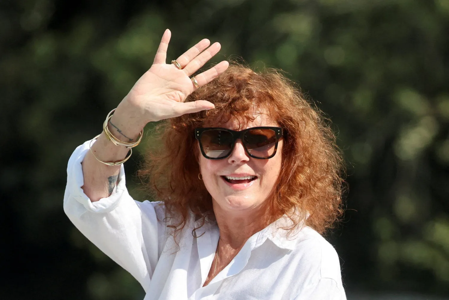 Susan Sarandon waves as she leaves the Excelsior Hotel, during the 83rd International Film Festival, Venice, Italy, September 5, 2026. REUTERS/Yara Nardi