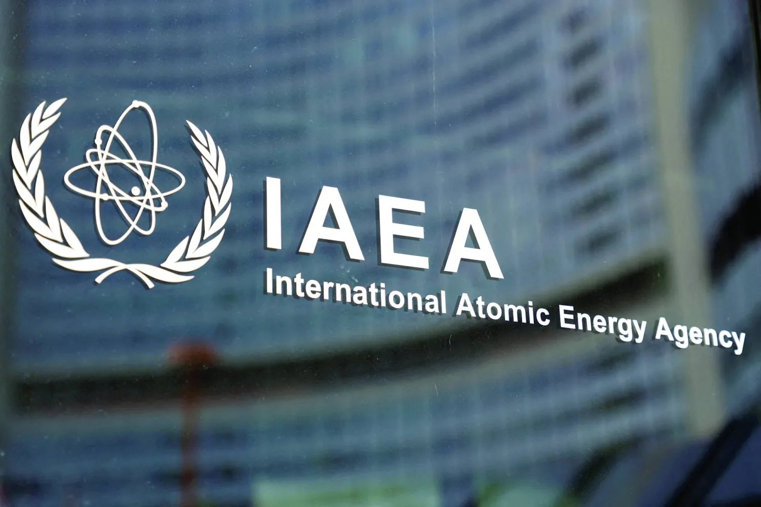 The logo of the International Atomic Energy Agency (IAEA) at the organization's headquarters in Vienna, Austria, March 6, 2023 (Reuters)