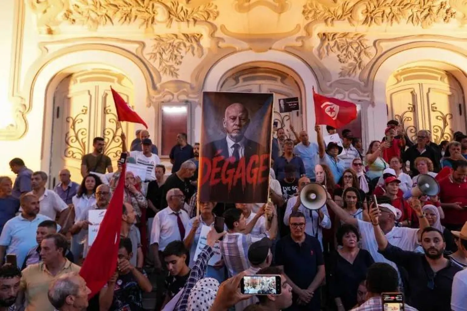 Protesters chant against President Kais Saied, in Tunis, Tunisia, August 20, 2026, demanding the restoration of democracy and calling for the release of jailed activists and journalists amid a worsening economic and social crisis (Jihed Abidellaoui/Reuters)