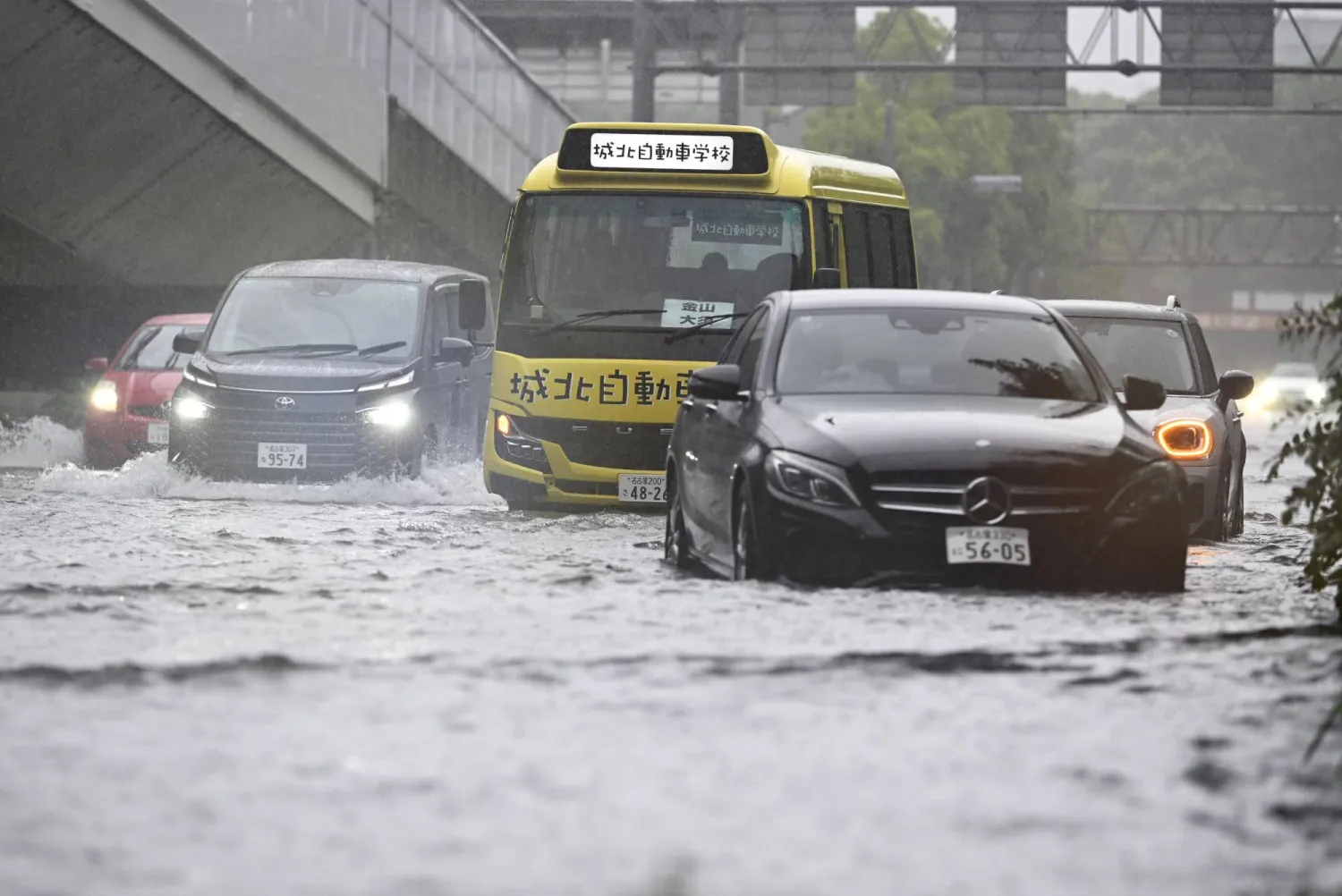  A street is flooded following a heavy rain in Nagoya, central Japan Tuesday, Sept. 8, 2026. (Kazushi Kurihara/Kyodo News via AP) 
