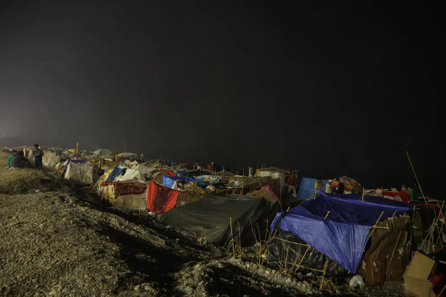 Improvised shelters at a makeshift camp in Trampolin Beach, following recent mass crossings of migrants from Morocco to Ceuta, in Ceuta, Spain, September 7, 2026. (Reuters) 