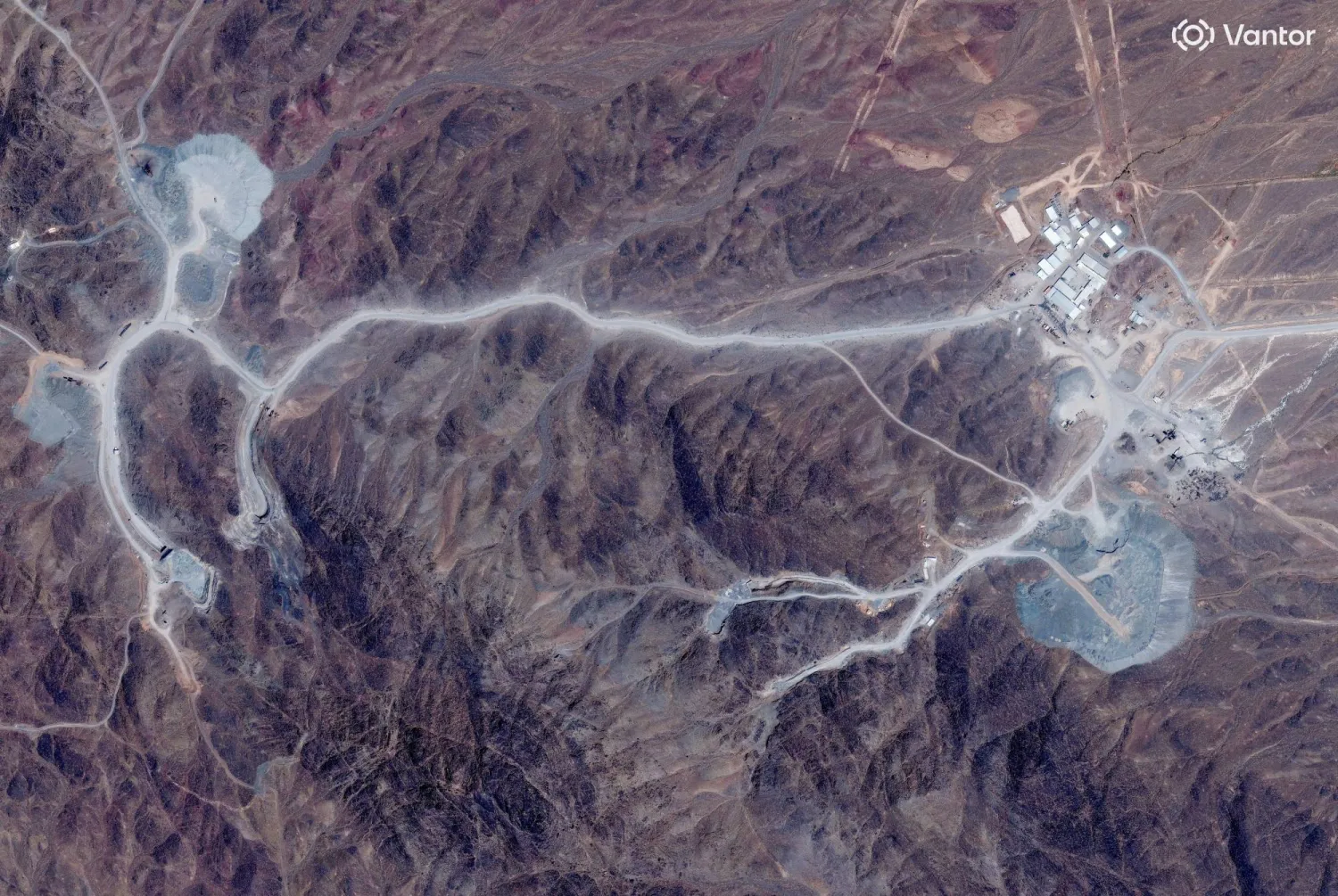FILE PHOTO: A satellite view shows tunnel entrances at Pickaxe Mountain, of the Natanz nuclear facility, near Natanz, Iran, June 30, 2026. Vantor/Handout via REUTERS