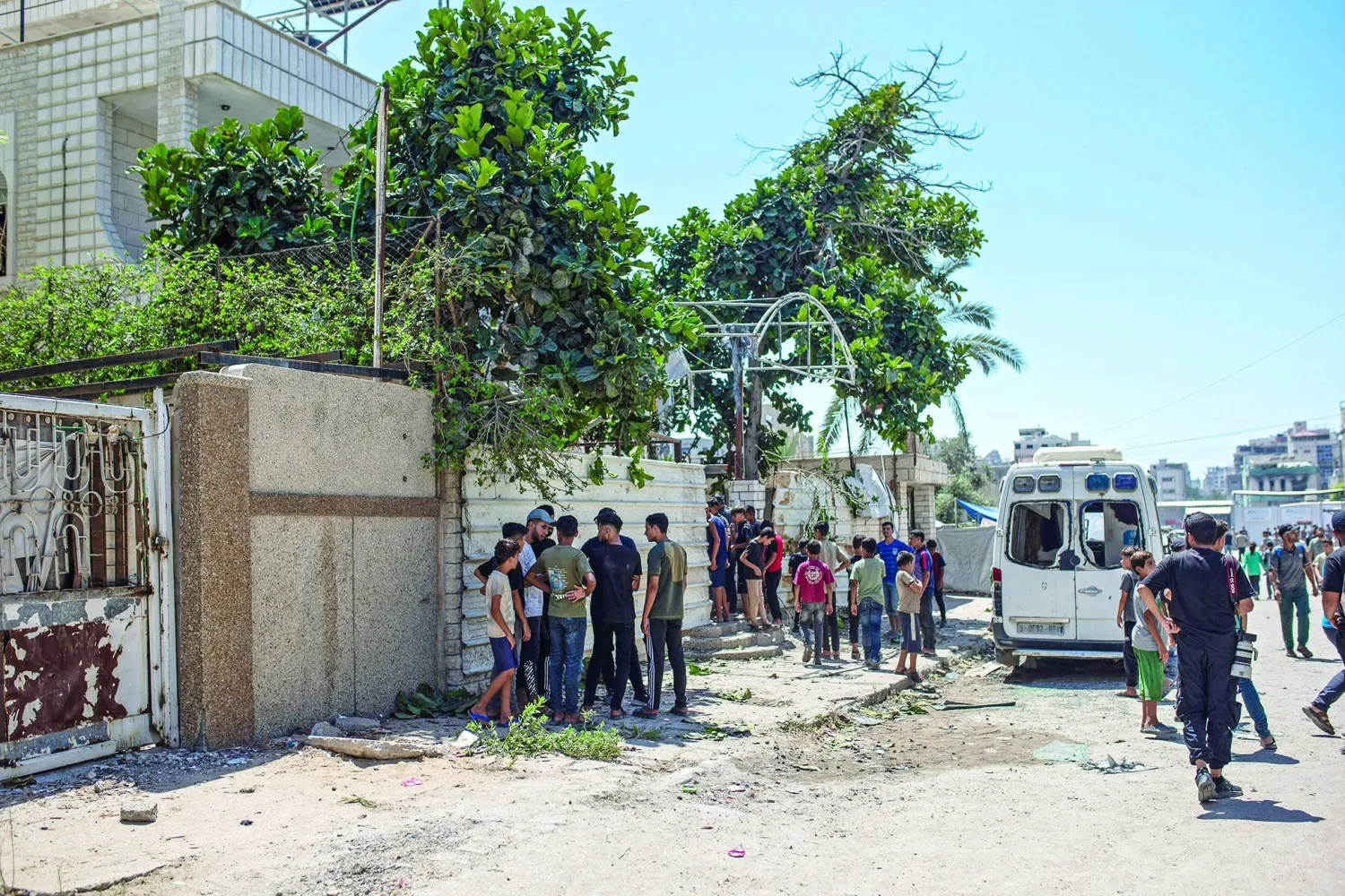  Locals gather at the site of an Israeli airstrike in Gaza City, 01 September 2026. According to the Ministry of Health in Gaza, at least four Palestinians were killed in Israeli air strikes on 01 September.  EPA/MOHAMMED SABER