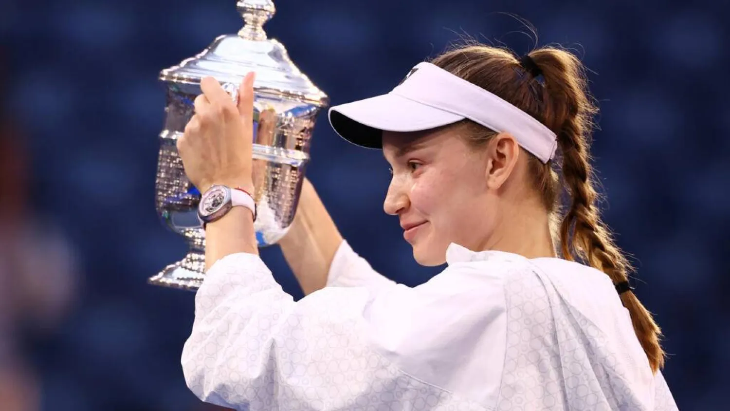 Elena Rybakina holds up the trophy after beating Aryna Sabalenka in the US Open final. CHARLY TRIBALLEAU / AFP
