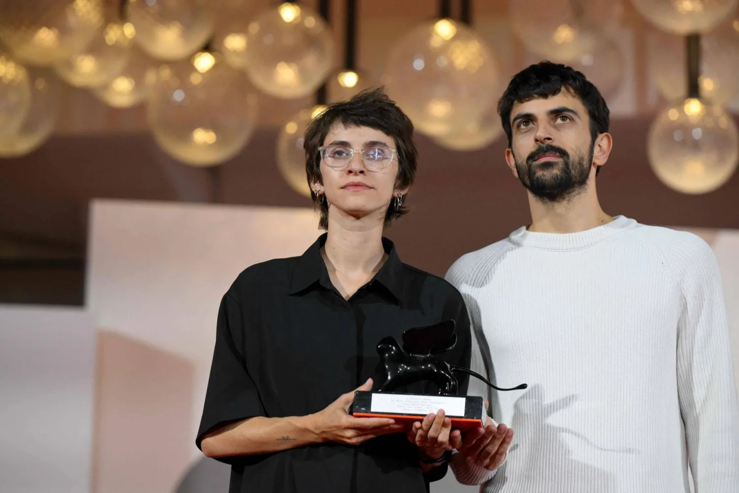 Director Yuval Abraham and Director Rachel Szor winners of the Special Jury Prize for "NAZA" attend a photocall on the red carpet following the closing ceremony of the 83rd Venice Film Festival at Venice Lido on September 12, 2026. (AFP) 
