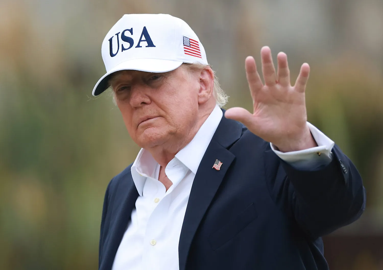 US President Donald Trump waves during a visit to Trump International Golf Links and Hotel in Doonbeg, Ireland, 13 September 2026. (EPA)