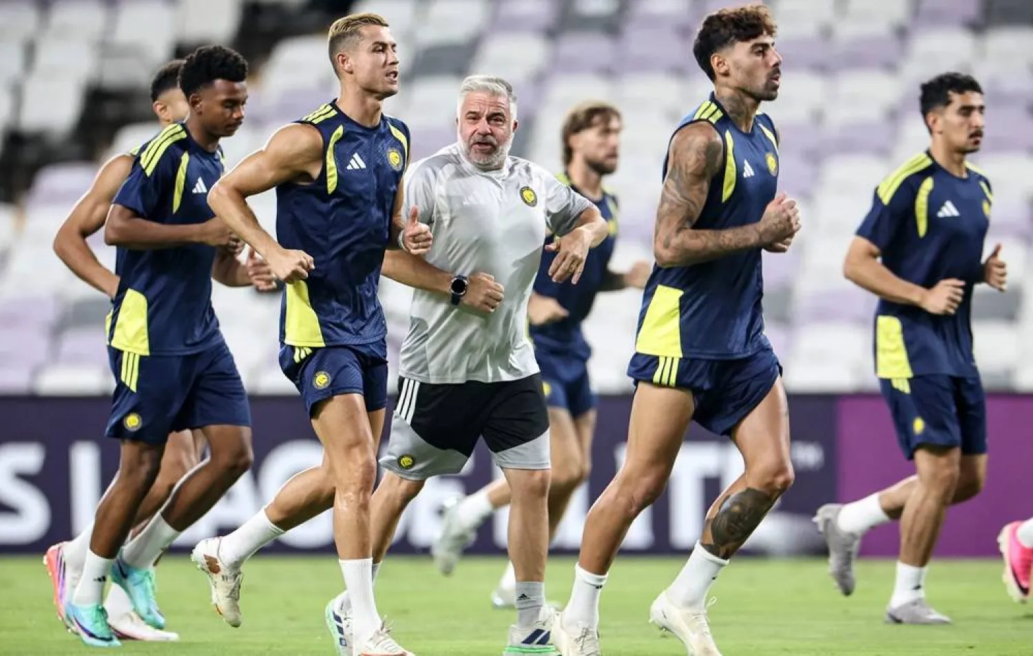 Al-Nassr FC's Portuguese forward #07 Cristiano Ronaldo (3rd L) attends a training session on the eve of the AFC Champions League Elite (ACL) match between Al-Ain FC and Saudi's Al-Nassr FC, at the Azza Bin Zayed stadium in al-Ain on September 14, 2026. (AFP) 