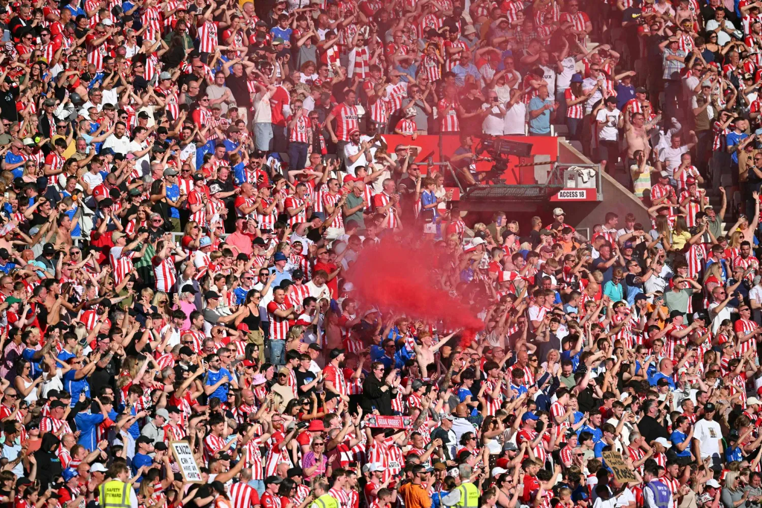 Sunderland fans celebrate after the English Premier League football match between Sunderland and Chelsea at the Stadium of Light in Sunderland in north-east England on May 24, 2026. (AFP)