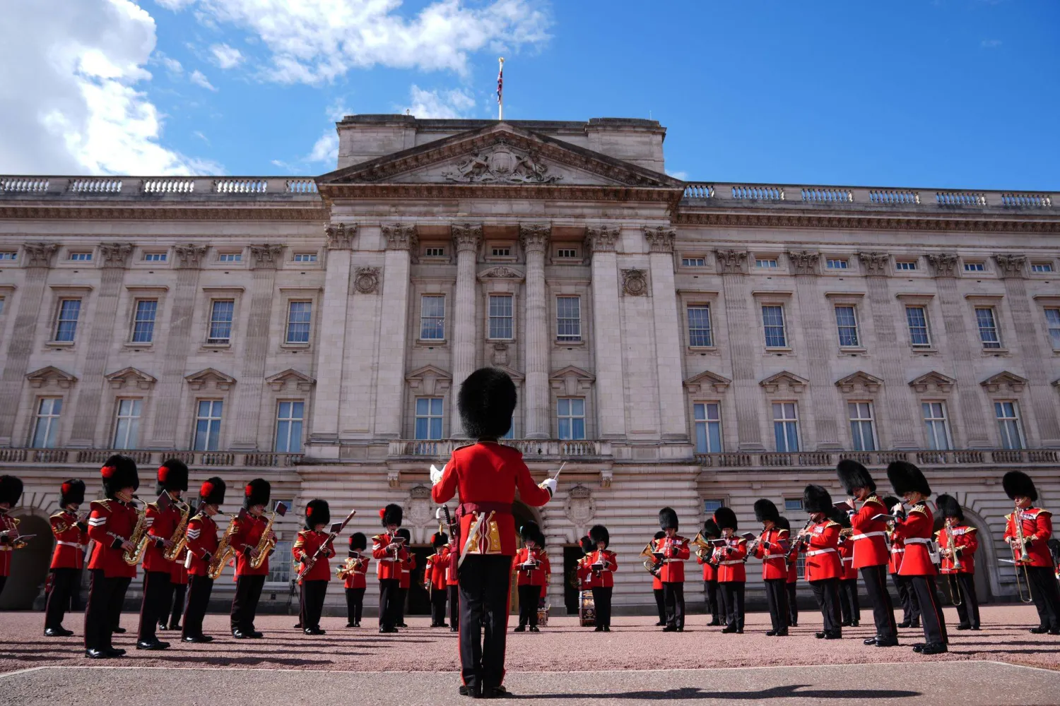  11 September 2026, United Kingdom, London: Members of the Massed Bands of the Guards Division perform on the forecourt of Buckingham Palace in London during a commemorative Changing of the Guard ceremony marking the 25th anniversary of the 11 September 2001 terrorist attacks. (dpa)
