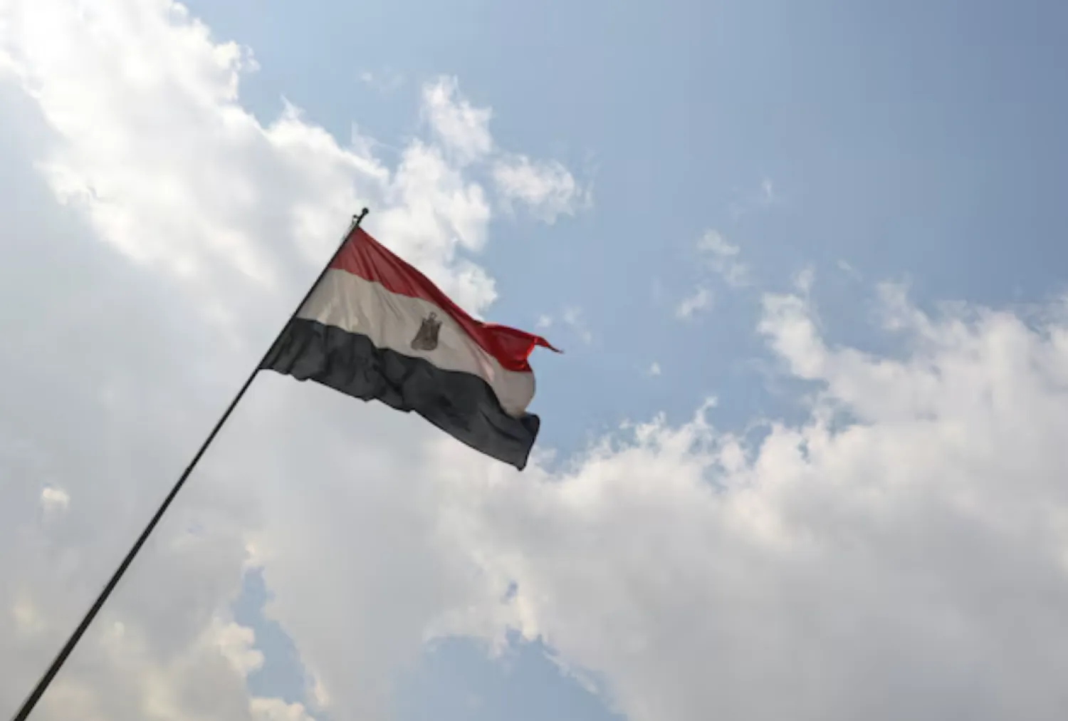 An Egyptian flag flutters in Cairo, Egypt, January 15, 2023. REUTERS/Mohamed Abd El Ghany/File Photo 