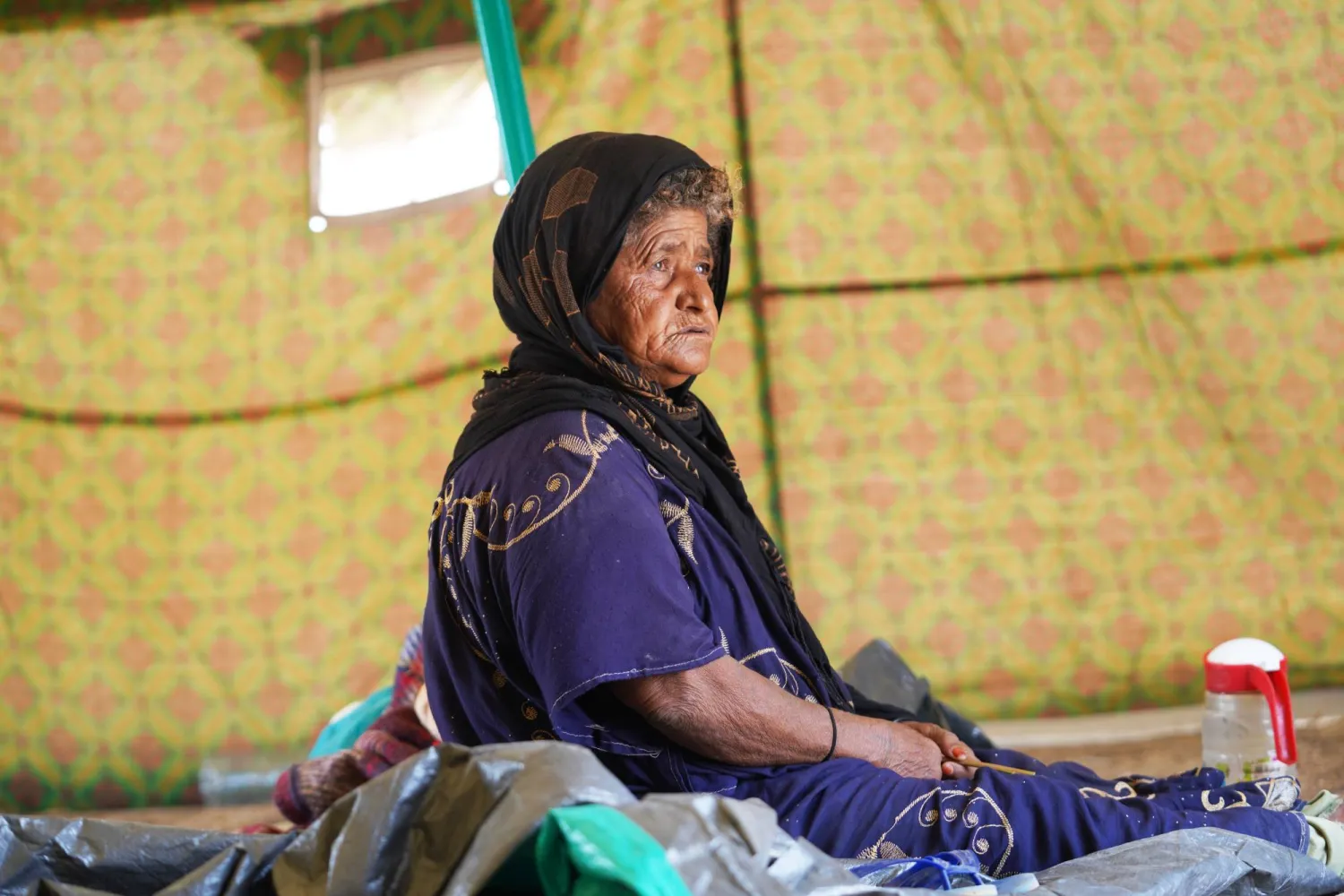  Salma Mohammed, 60, a displaced Yemeni woman, sits inside her tent at the Al-Firdaws camp in Ras Imran, just outside Aden, Yemen, Monday, Sept. 14, 2026. (AP)