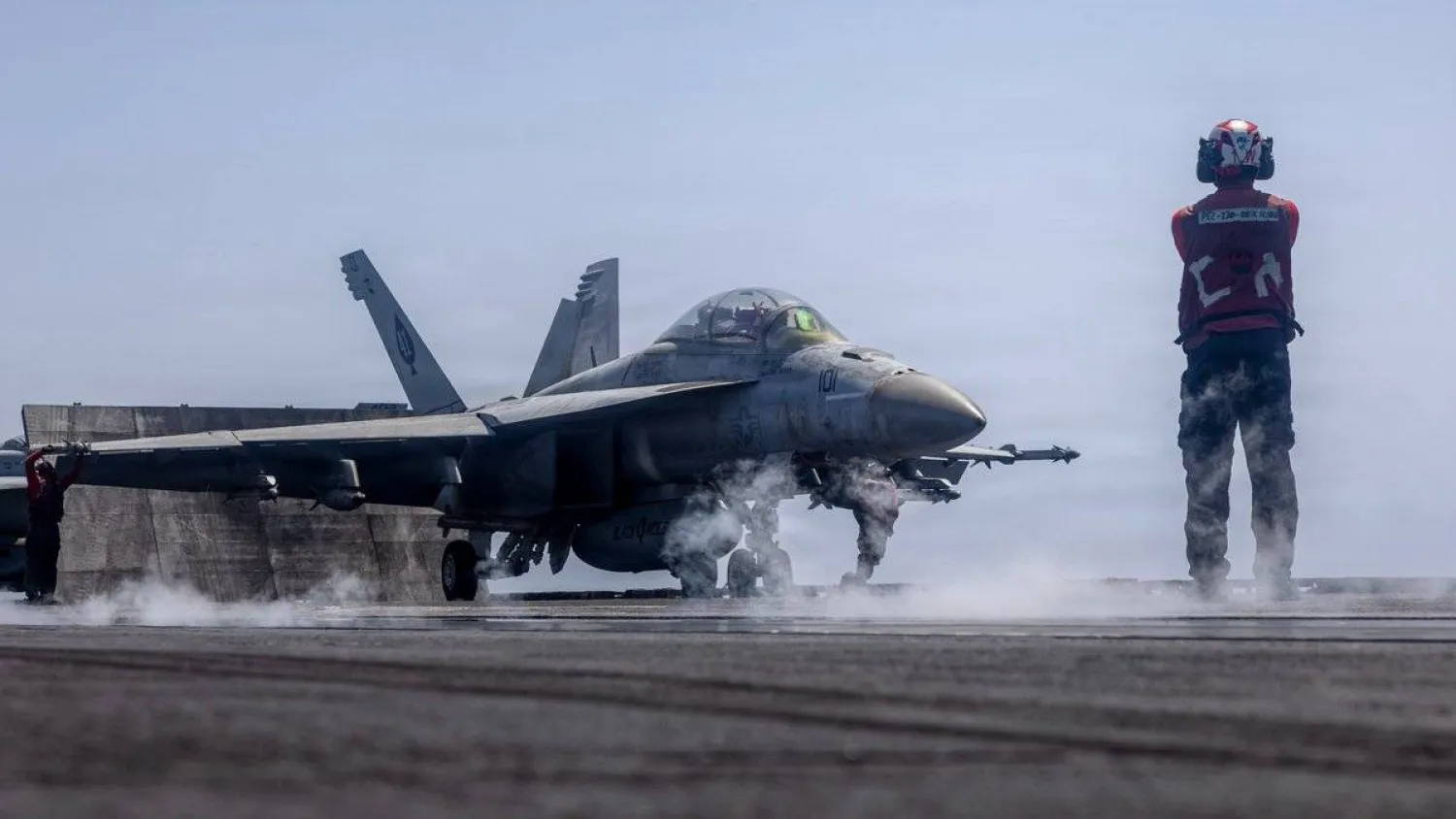A US fighter jet prepares for takeoff from an aircraft carrier in the Arabian Sea (CENTCOM)