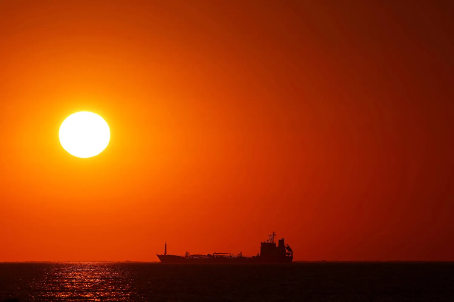  An oil tanker sails near the oil hub at the port of Fos-Lavera at sunset near Marseille, southern France, September 15, 2026. (Reuters)