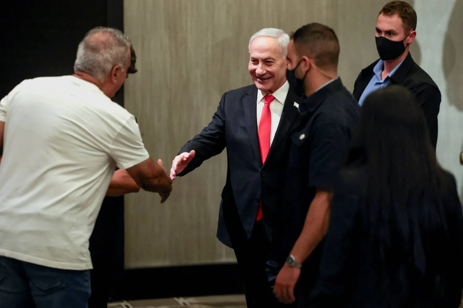 Israeli Prime Minister Benjamin Netanyahu greets supporters after delivering a statement to members of the press, in Jerusalem, September 8, 2026. (Reuters) 