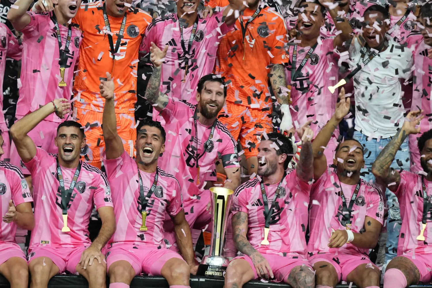 Inter Miami forward Lionel Messi, center, celebrates with his teammates after winning the Campeones Cup soccer match against Cruz Azul, Wednesday, Sept. 16, 2026, in Miami. (AP Photo/Lynne Sladky)