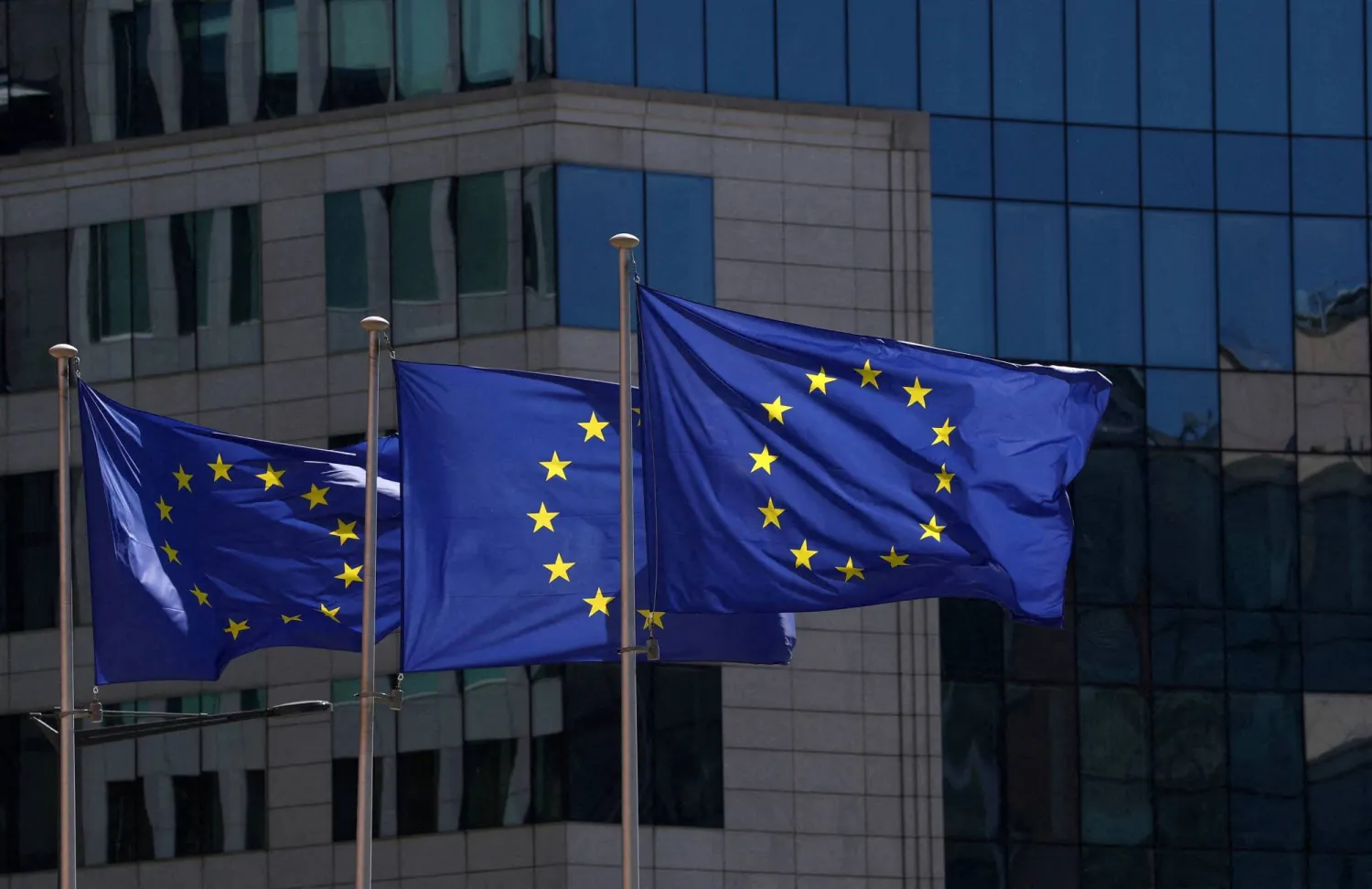 FILE PHOTO: European Union flags flutter outside the European Commission headquarters in Brussels, Belgium April 29, 2026. REUTERS/Yves Herman/File Photo