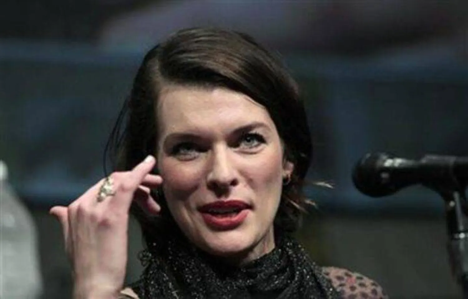 Cast member Milla Jovovich speaks during a panel for "Resident Evil: Retribution" during the Comic Con International convention in San Diego, California July 13, 2012. REUTERS/Mario Anzuoni/Files