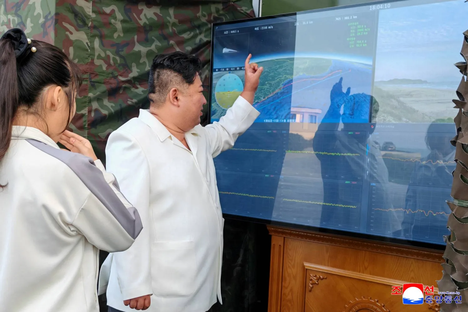 North Korean leader Kim Jong Un, accompanied by his daughter Kim Ju Ae, attends a test of a new type of weapon in Pyongyang, North Korea, in this picture released by North Korea's official Korean Central News Agency on September 22, 2026. (KCNA via Reuters)
