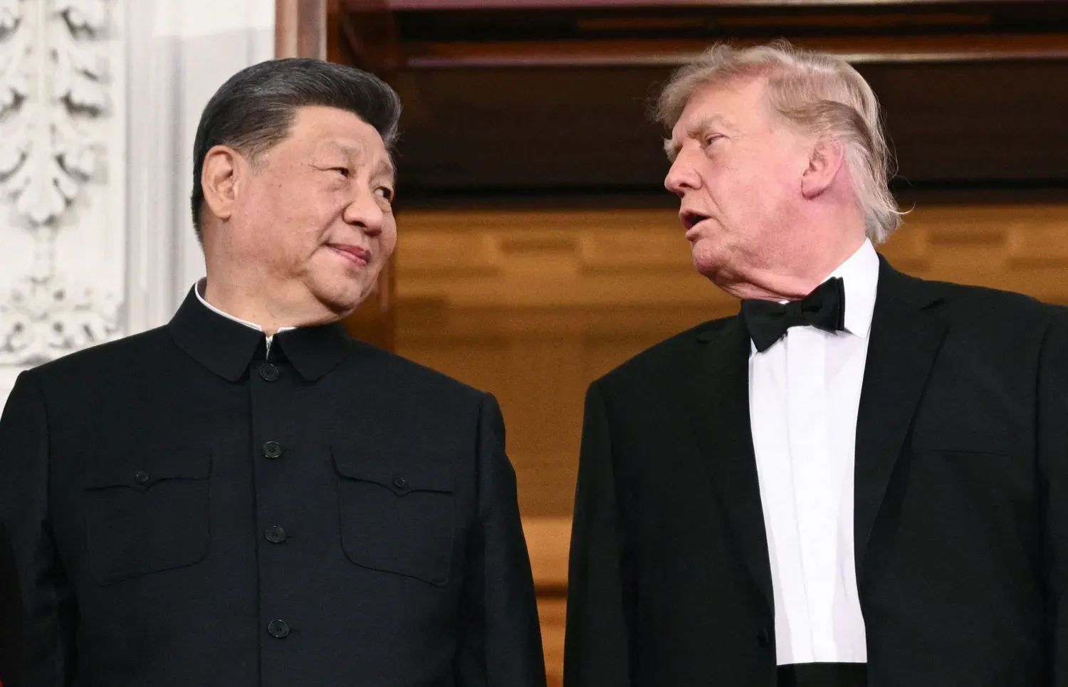 Çin Devlet Başkanı Şi Cinping ve ABD Başkanı Donald Trump, Beyaz Saray’daki resmi akşam yemeği öncesinde (AFP)