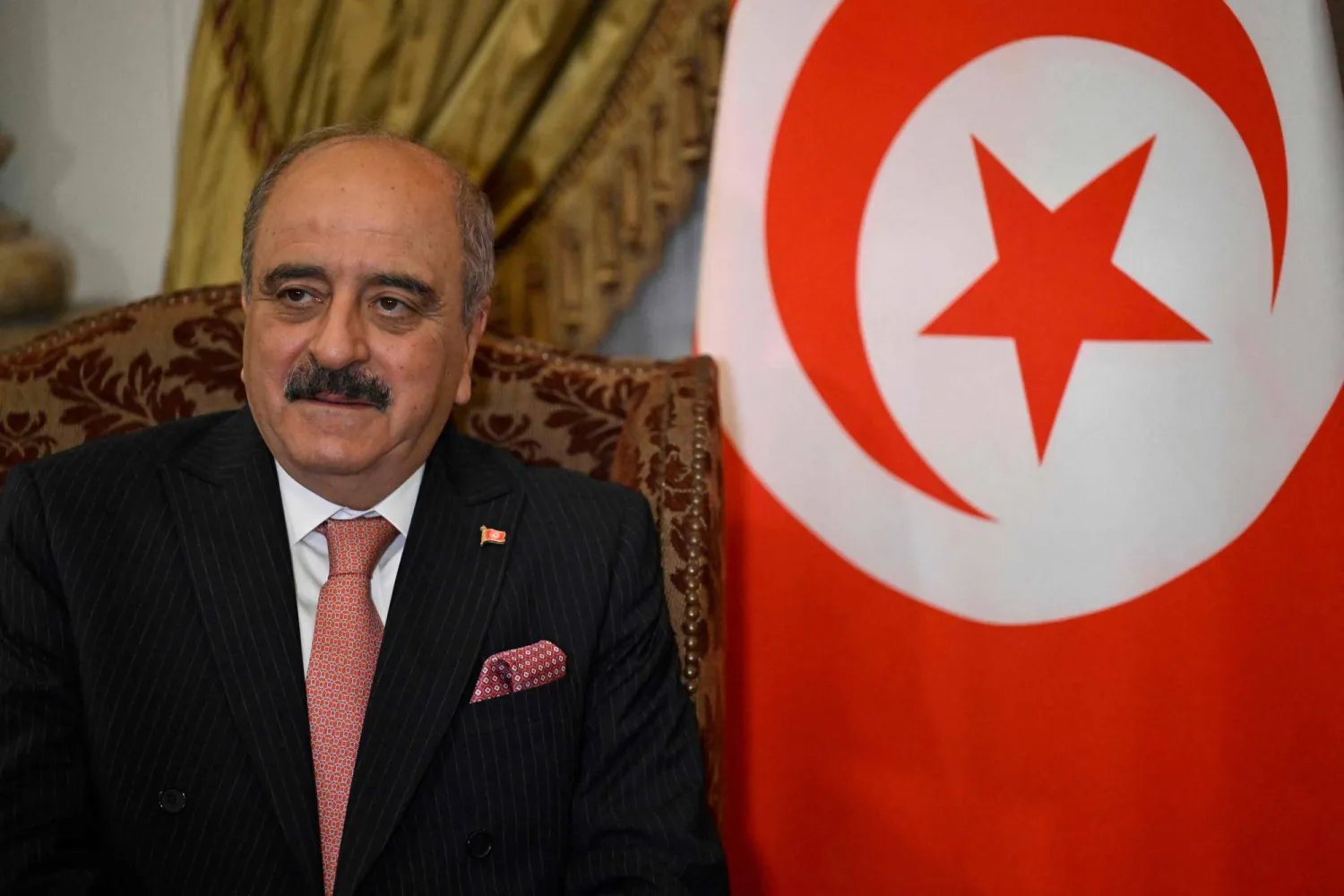 وزير الشؤون الخارجية والهجرة والتونسيين بالخارج محمد علي النفطي (أ.ف.ب)