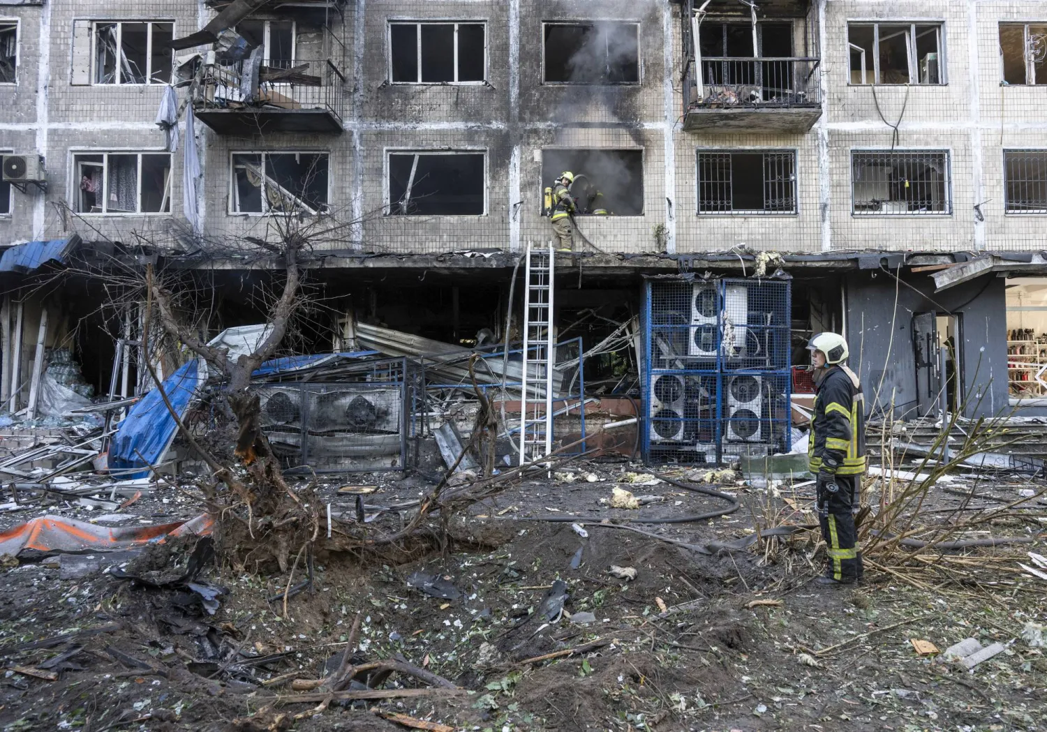 A Ukrainian rescuer works at the site of a Russian attack on a five-story residential building in Kyiv, Ukraine, 26 September 2026, amid the Russian invasion. EPA/MAXYM MARUSENKO