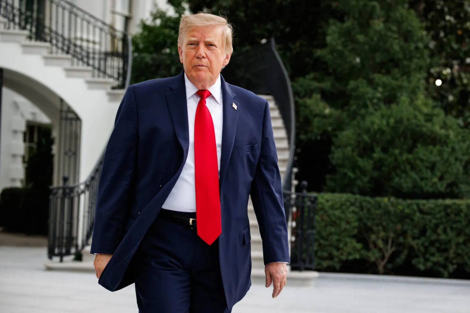 US President Donald Trump walks out of the South Portico towards members of the press before departing from the new South Lawn helipad in Marine One at the White House in Washington, DC, USA, 26 September 2026. EPA/Samuel Corum / POOL