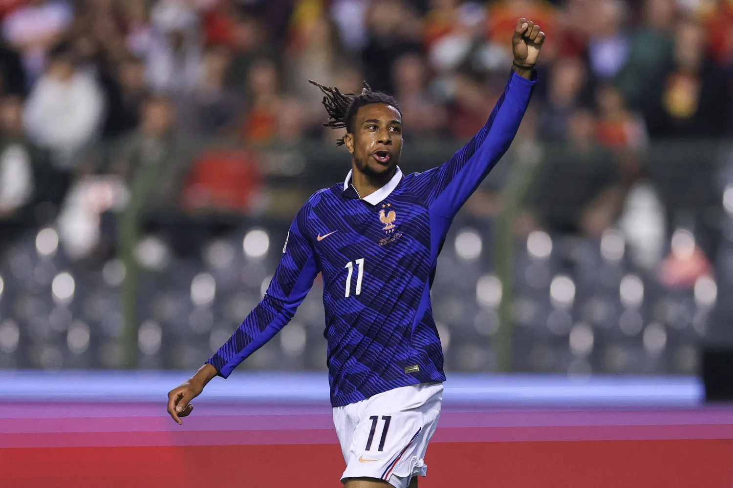  France's midfielder #11 Michael Olise celebrates scoring his team's first goal during the UEFA Nations League Group A1 football match between Belgium and France at King Baudouin Stadium in Brussels on September 28, 2026. (AFP) 